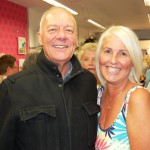 Man and woman smiling to camera