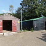 Two wooden sheds