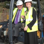 Man and woman in digger