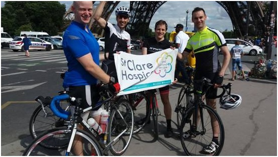 Team with banner in Paris