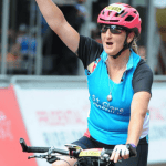 Joanne crossing the finishing line at the Prudential Ride