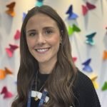 Headshot of Events Relationship Fundraiser Rosie Brewer. She can be seen smiling directly at the camera.