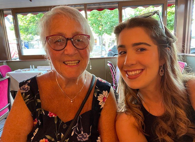 Benita and her granddaugher Elysa are pictured in a selfie photo smiling at the camera.