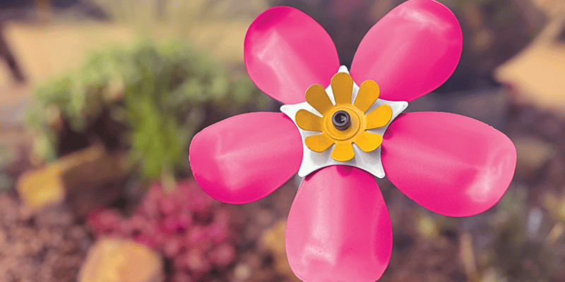 A photo of the limited edition pink St Clare Hospice bespoke ironwork Forever Flower.