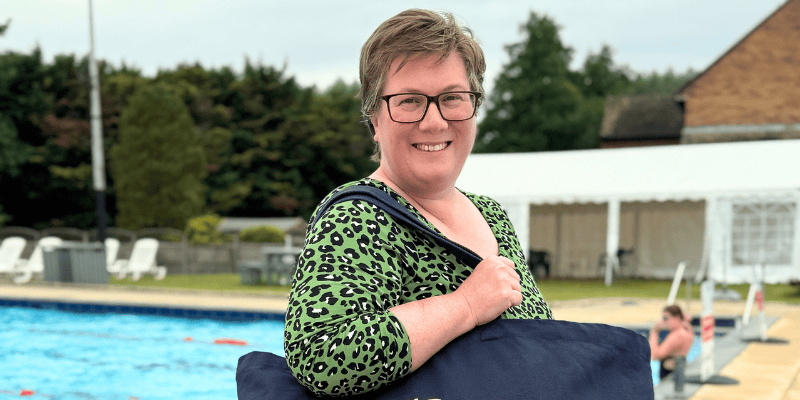 Photo of St Clare Hospice CEO at a Lido where she is completing her swim marathon.