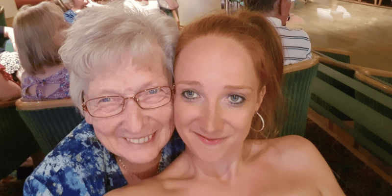 A photo of Laura's nan (left) and her (right) smiling at the camera.